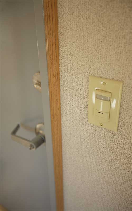 Wood trim on the inside of a mobile office trailer.