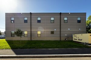 Side view of two story fire station living quarters