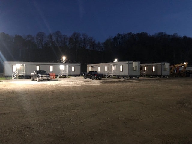 Nighttime view of three 12’x60’ mobile offices