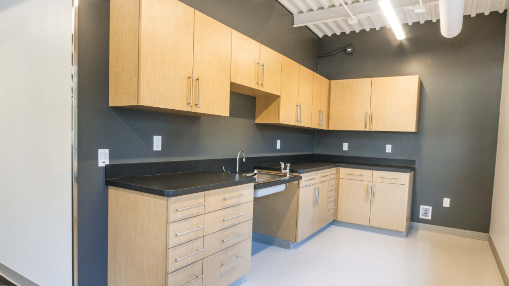 Modern kitchen in a triumph modular building, showcasing sleek cabinetry and efficient layout for modular construction.