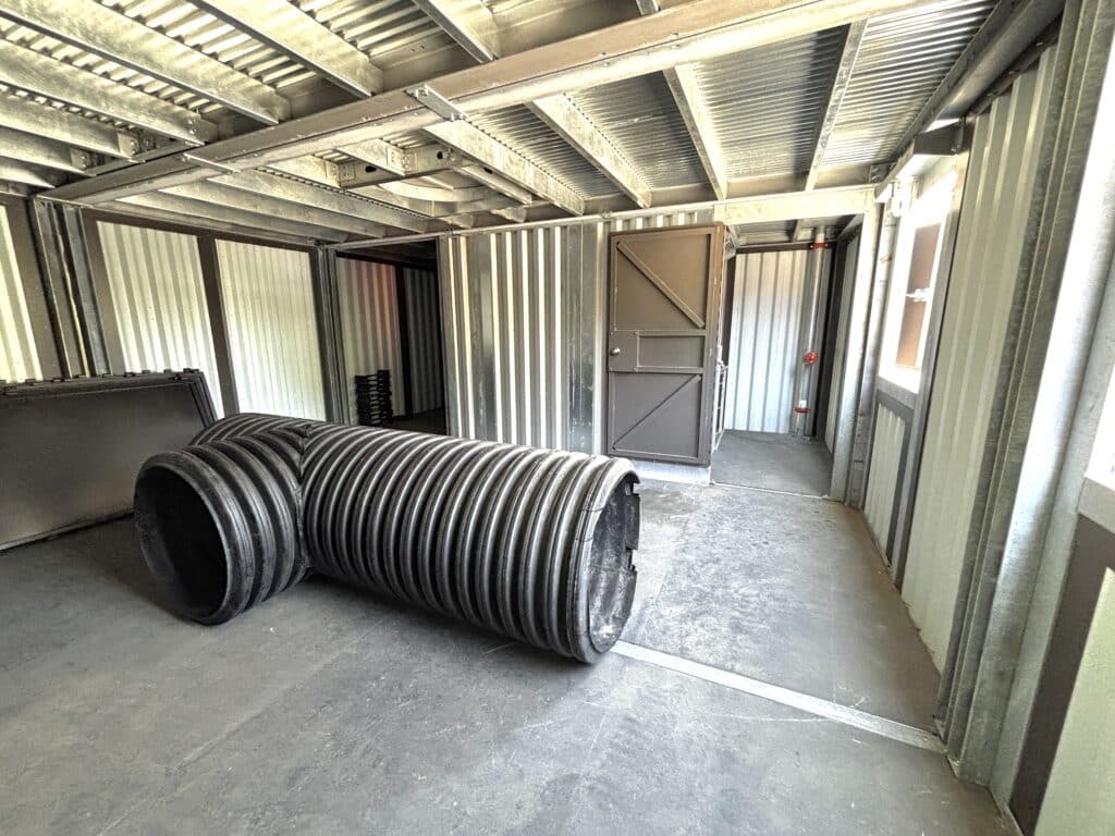 Interior image of Cambridge Fire Department Training Facility. Featuring steel and tubing used during training activities.