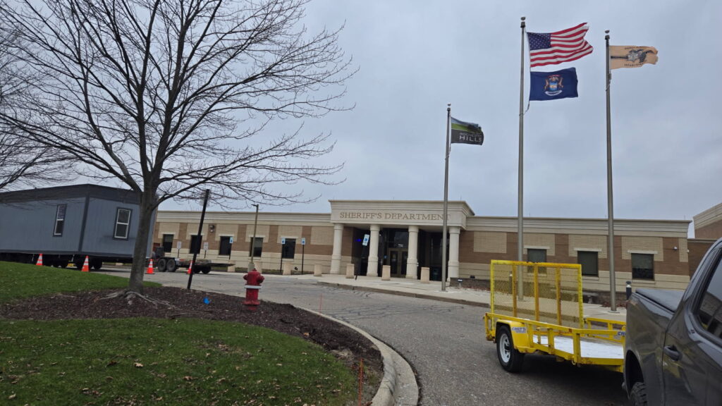 Building delivery day with Rochester Hill City offices in the background
