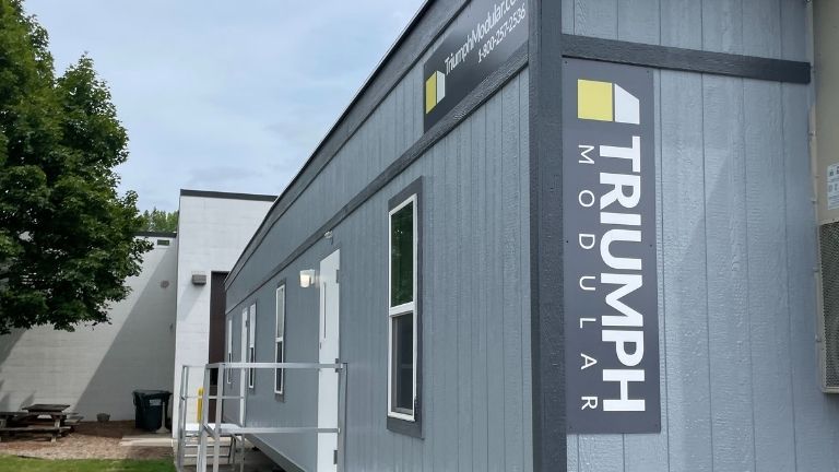 Triumph Modular gray double-wide buildings serving Rochester Hills MI Sheriff dispatch and city clerk offices