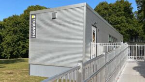 a modular classroom building with ada compliant ramp installed by Triumph modular at Carpenter Elementary School in Wolfeboro, NH